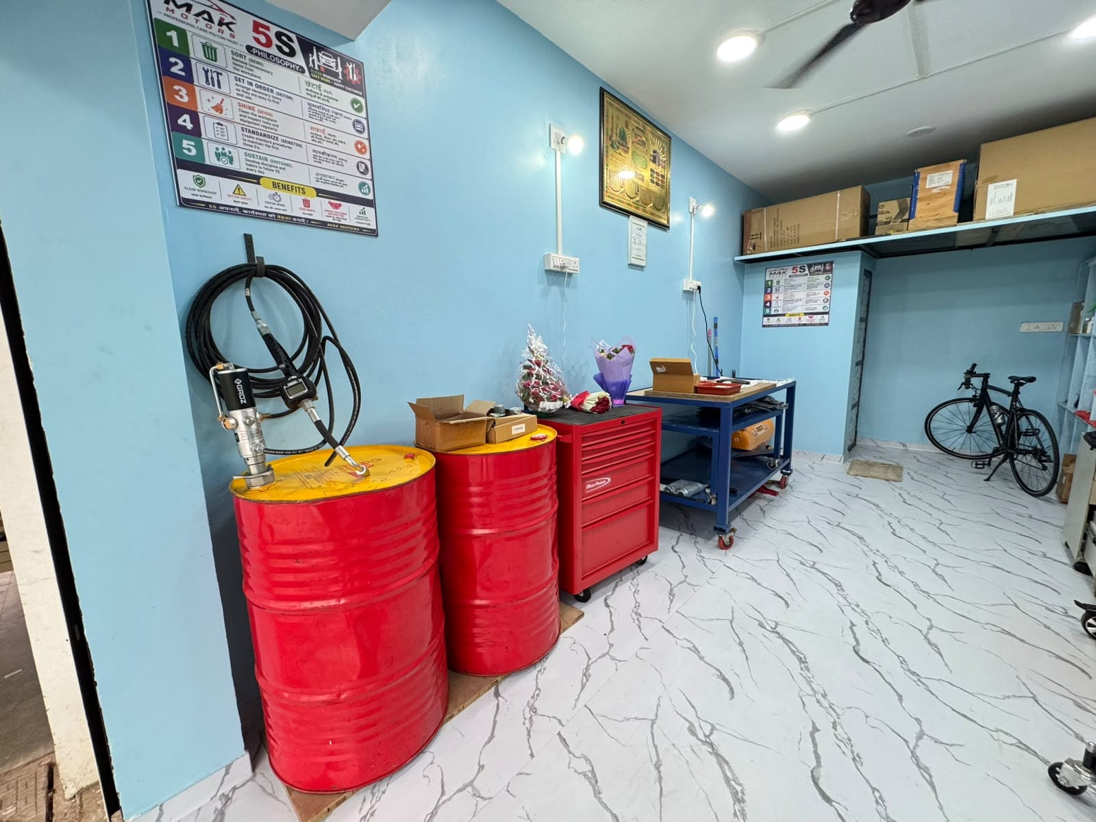 Oil barrels and tool cabinet in the workshop